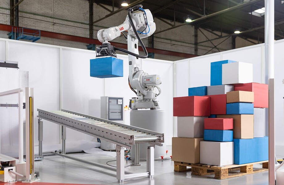 robots stacking boxes
